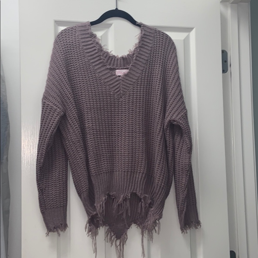Distressed sweater